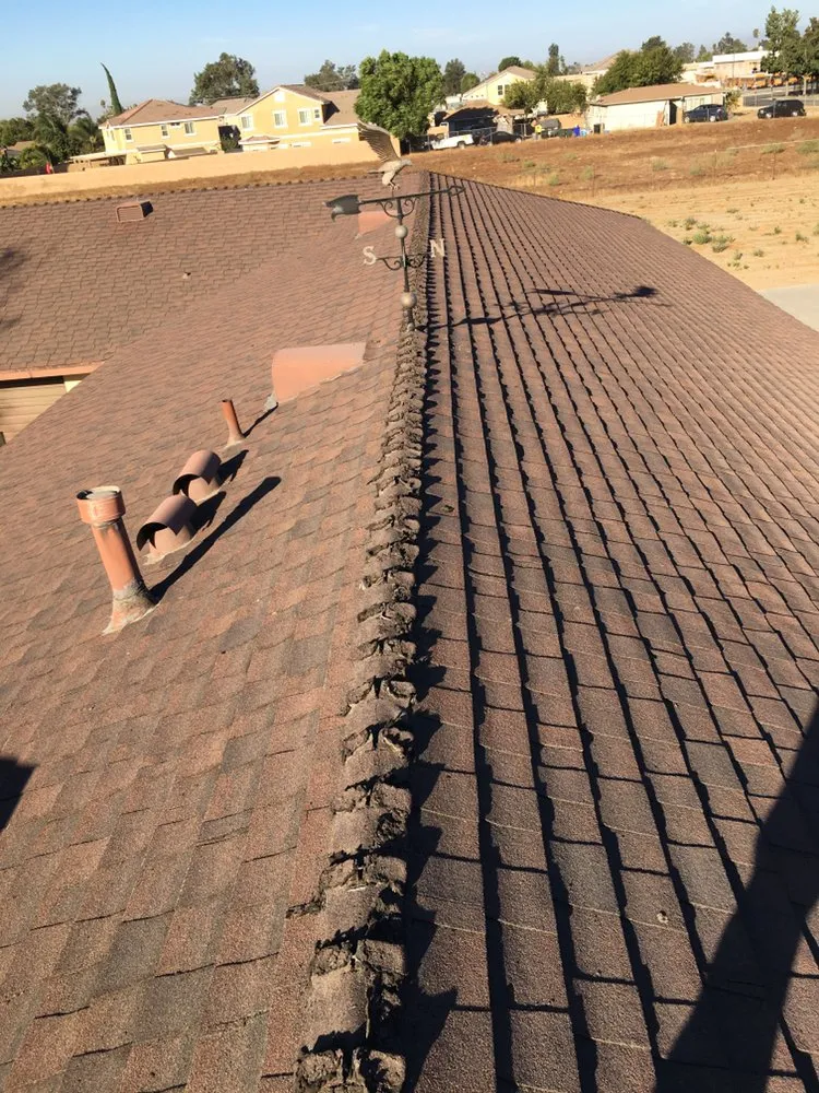 Slide of Lopez Roofing