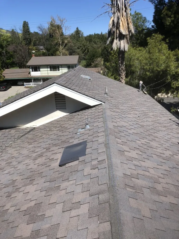 Slide of Lopez Roofing