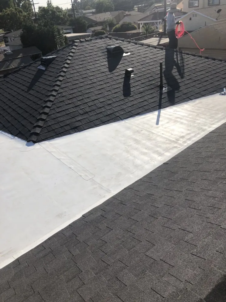 Slide of Lopez Roofing