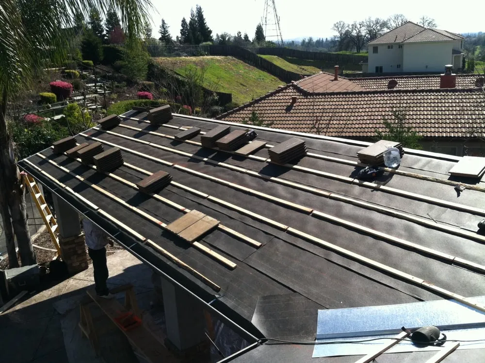 Expert flat roof repair after storm damage in Placerville Ca, CA by Lopez Roofing