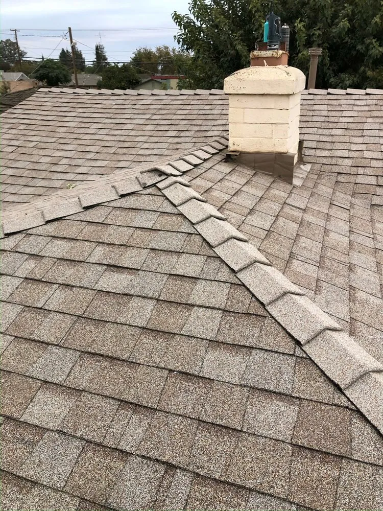 Slide of Lopez Roofing Services