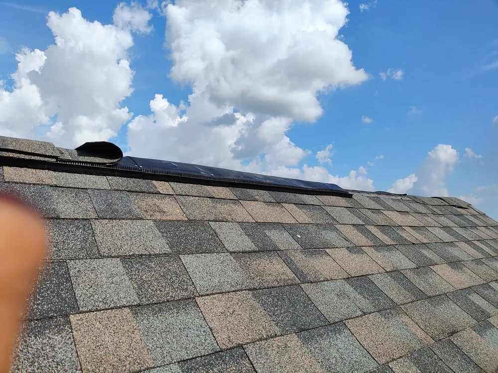 Slide of Lopez's Roofing