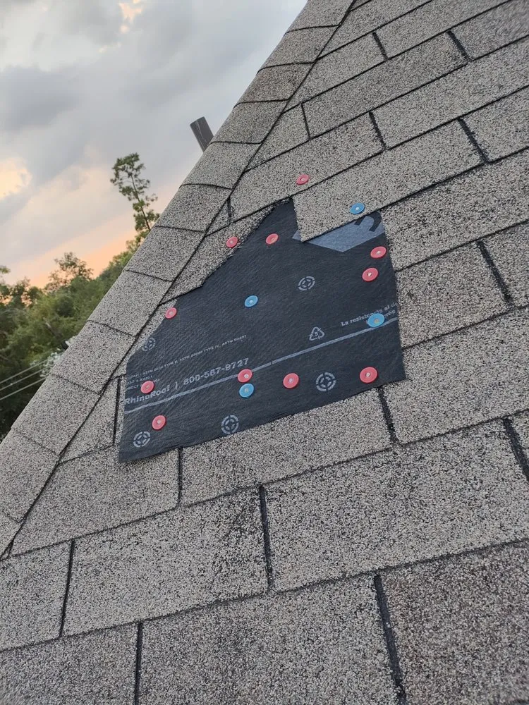 Slide of Lopez's Roofing