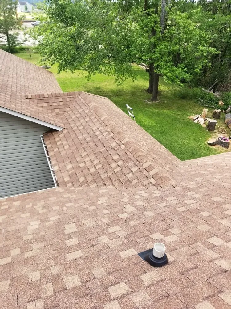 Slide of Lopez's Roofing Services