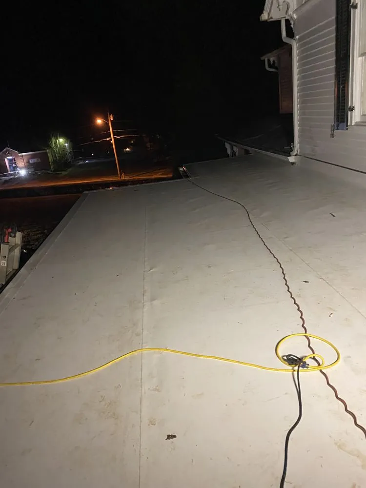 Slide of Los Gavilanes Roofing