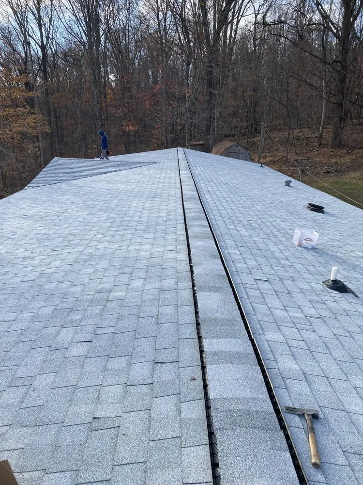 Slide of Los Gavilanes Roofing