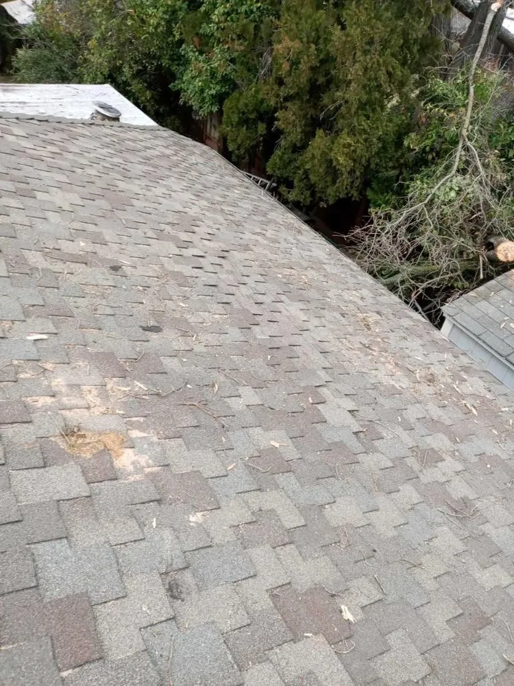 Slide of Los Reyes Roofing