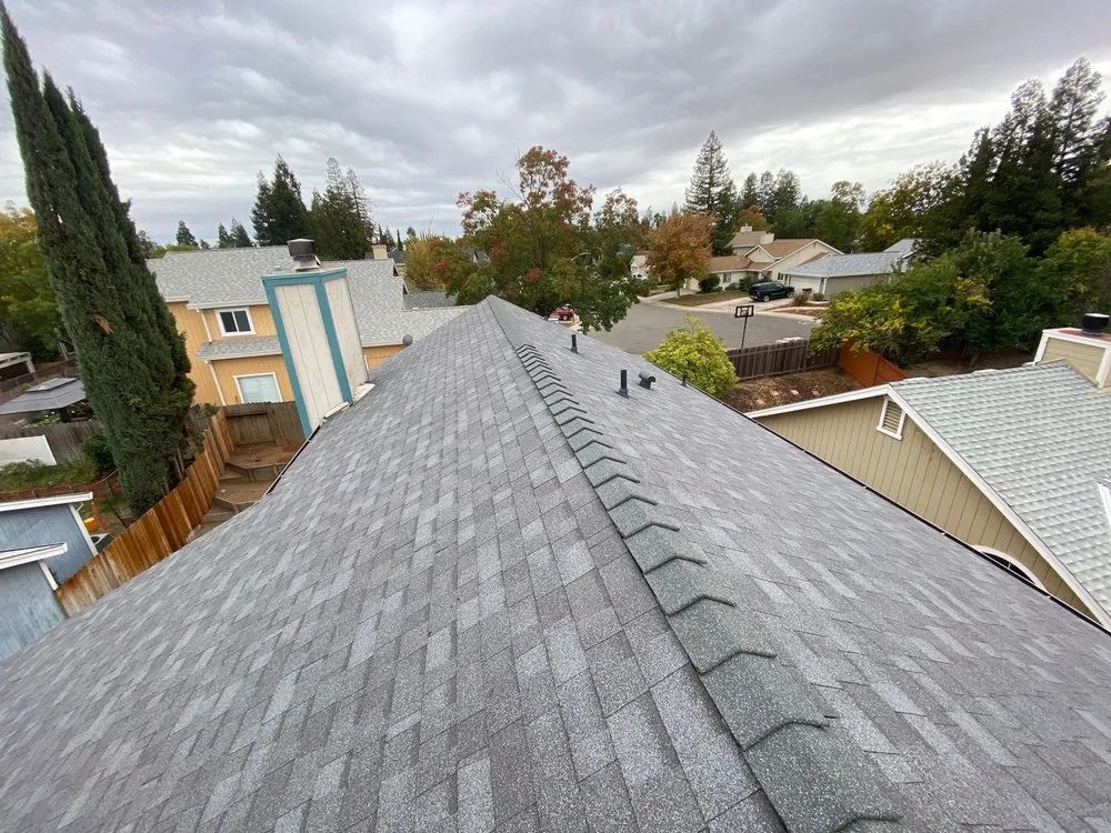 Slide of Los Reyes Roofing