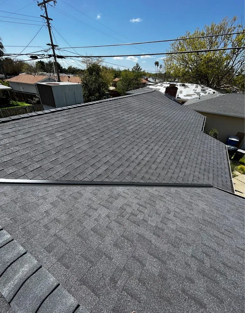 Slide of Los Reyes Roofing