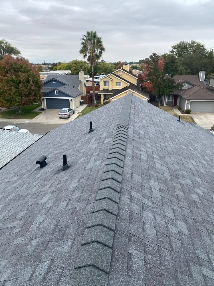 Slide of Los Reyes Roofing