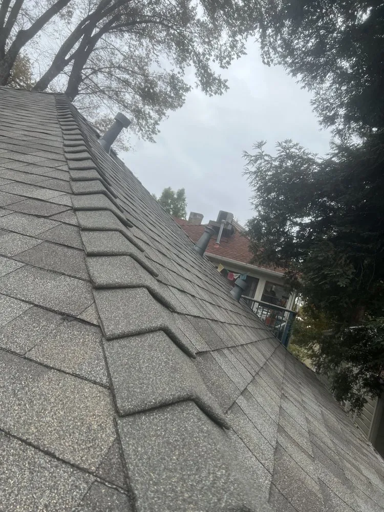 Slide of Los Reyes Roofing