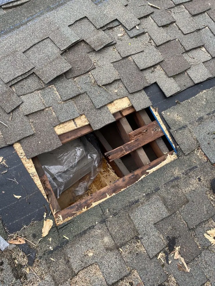 Slide of Los Reyes Roofing