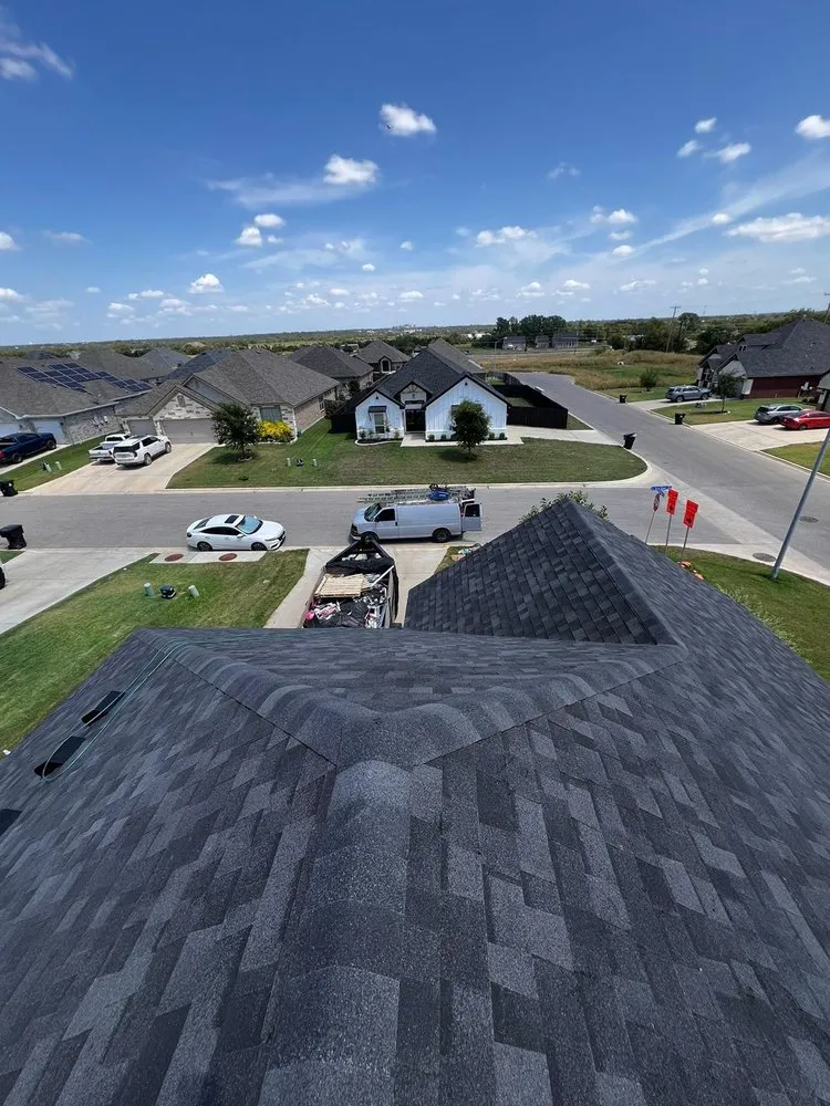 Slide of Los Speedy Rooferos