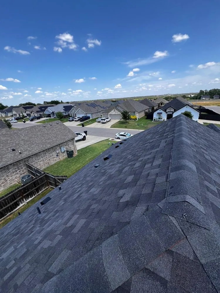 Slide of Los Speedy Rooferos