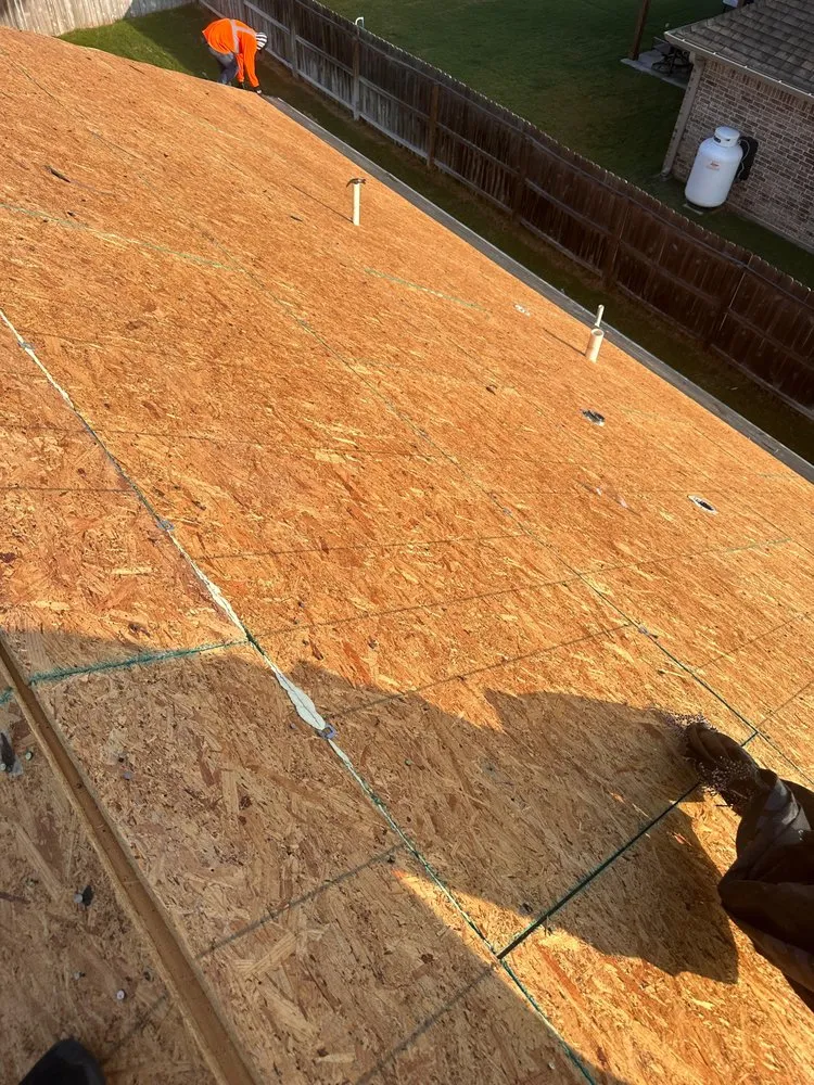 Slide of Los Speedy Rooferos