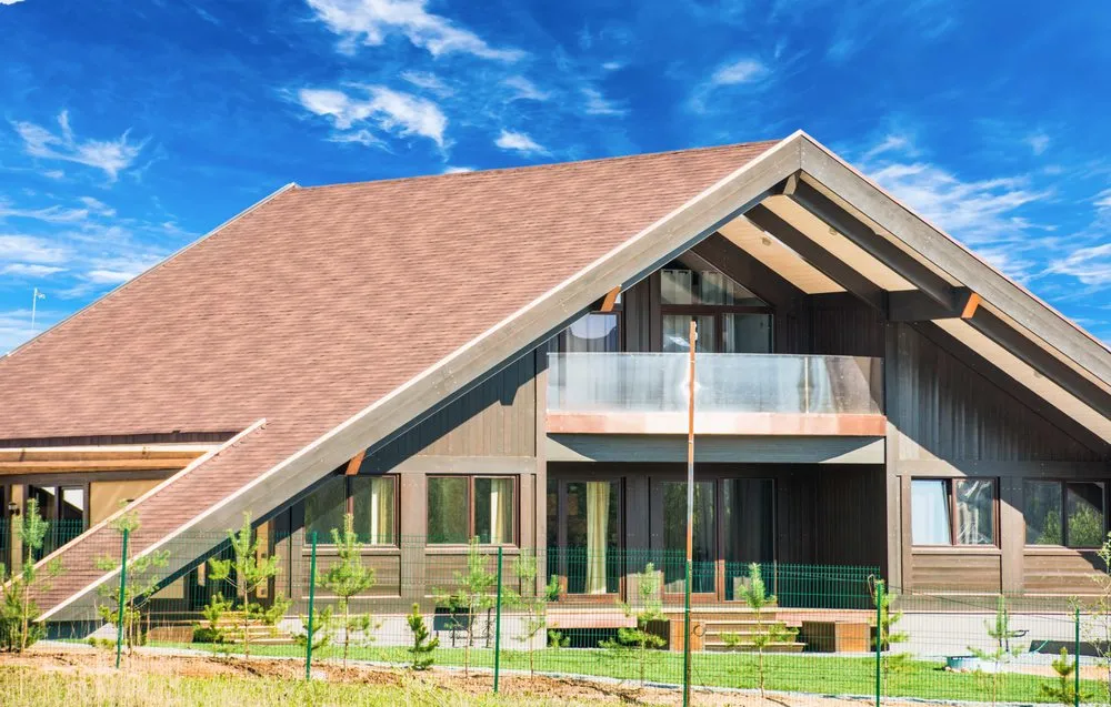 Slide of Los Tres Hermanos Roofing