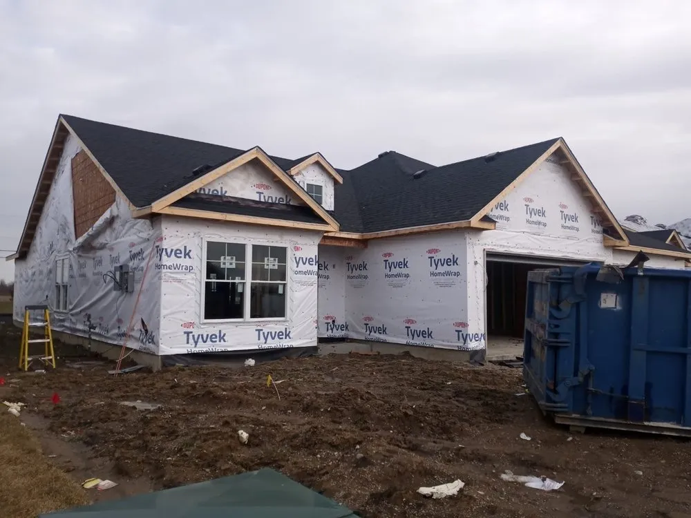 Slide of Los Tres Hermanos Roofing