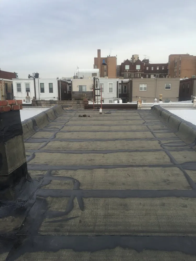 Slide of Louis Pera Roofing Contractor