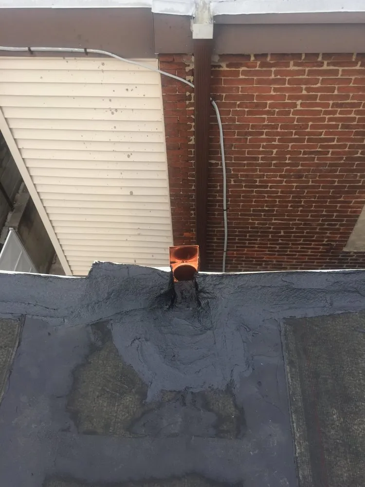 Slide of Louis Pera Roofing Contractor