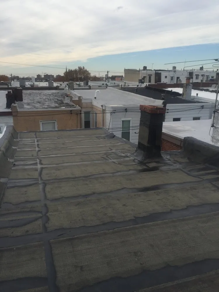 Slide of Louis Pera Roofing Contractor