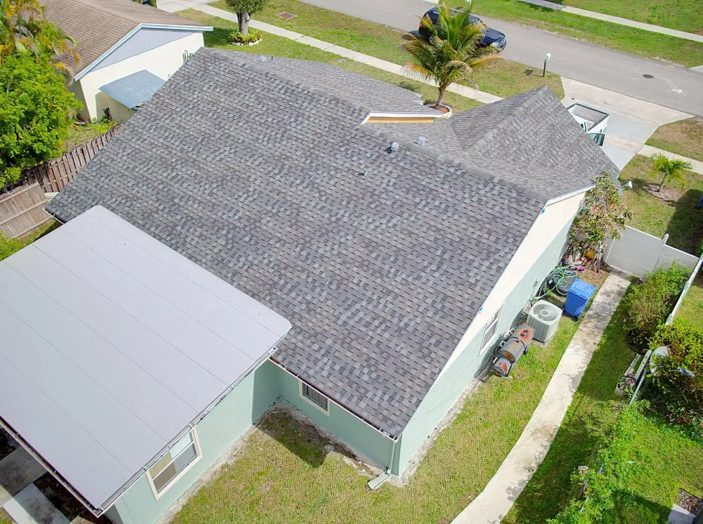 Slide of Louis Roofing