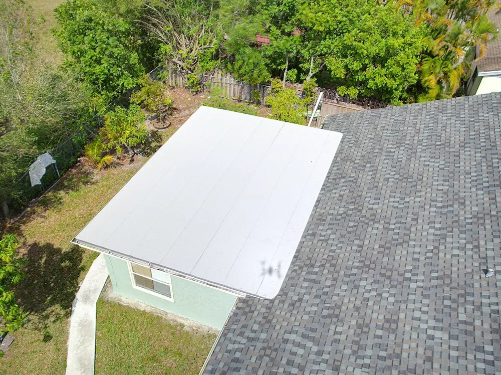 Slide of Louis Roofing