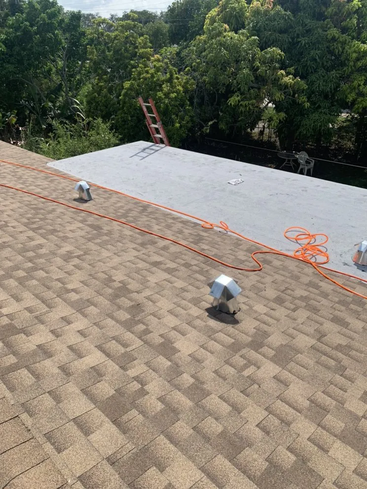 Slide of Louis Roofing