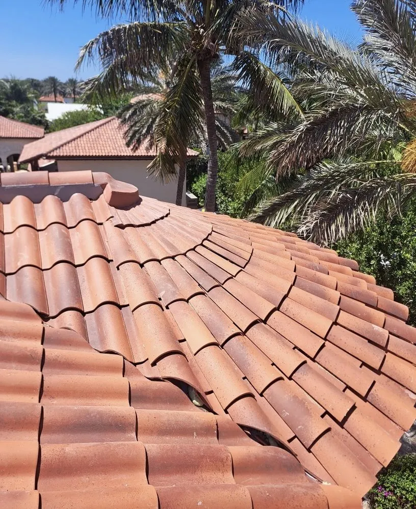 Slide of Louis Roofing