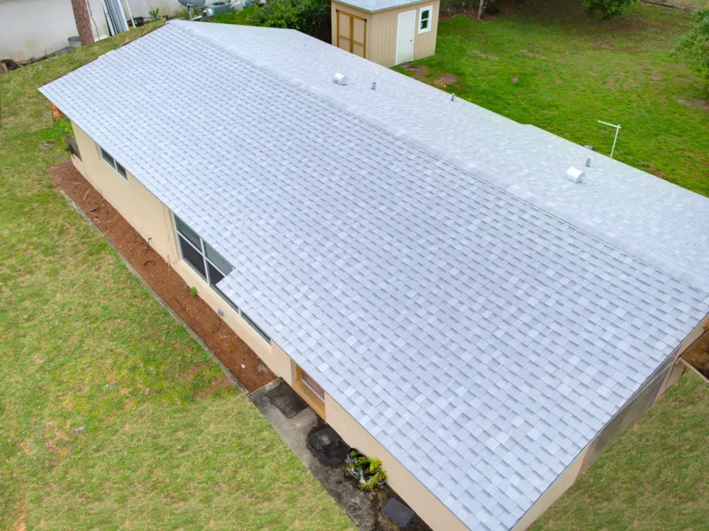 Slide of Louis Roofing