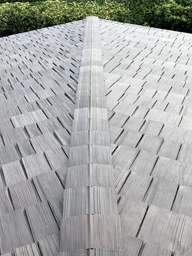 Slide of Louis Roofing