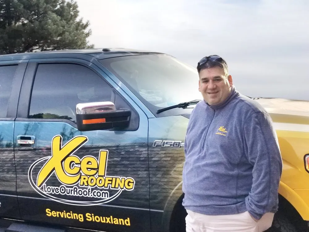 Slide of LoveOurRoof- Xcel Company