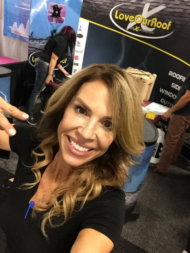 Slide of LoveOurRoof, an Xcel Company