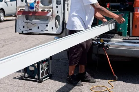 Slide of Lowe-Boykin Roof & Gutter