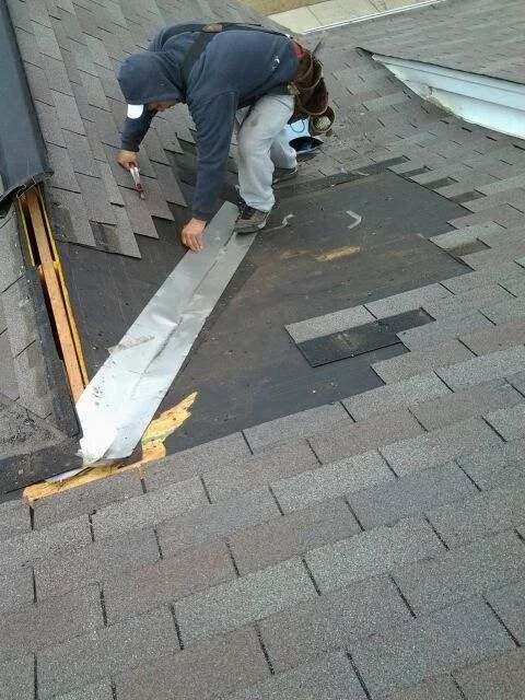 Slide of Lowe-Boykin Roof & Gutter