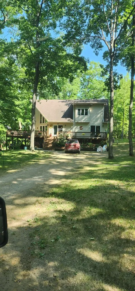 Licensed storm damage roof repair after storm damage across Chippewa Lake, MI - L&R Construction