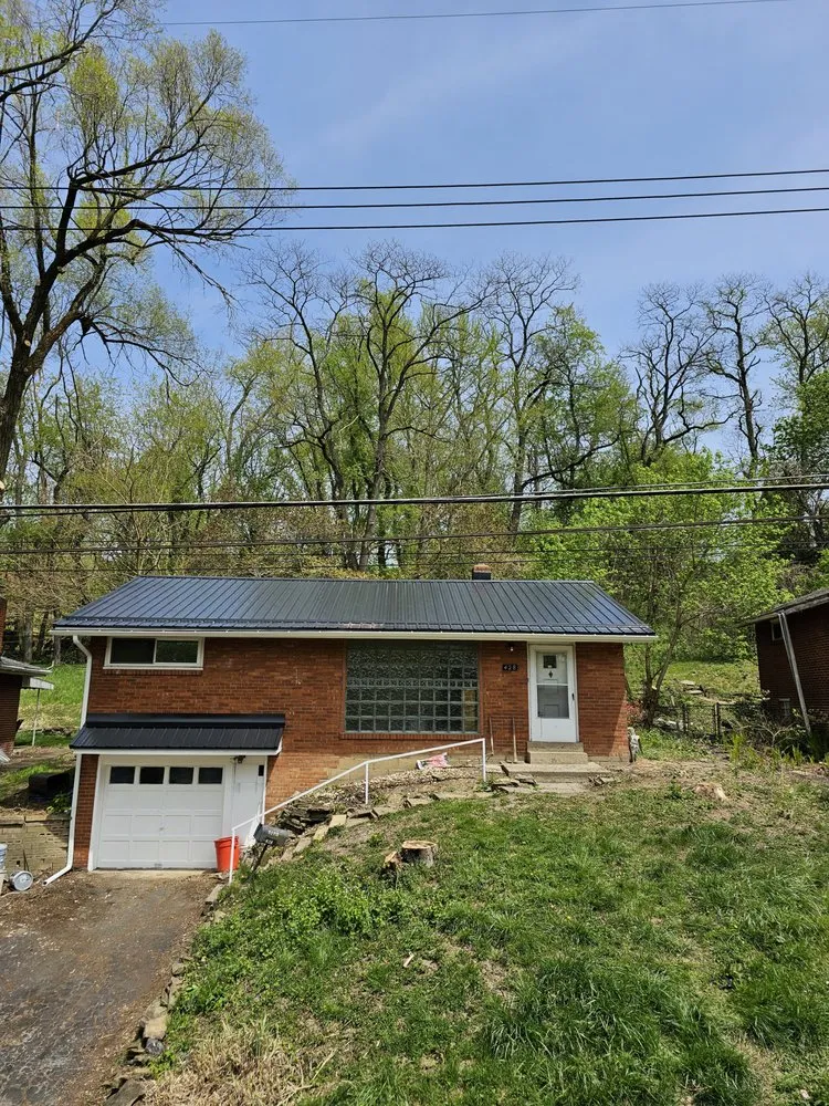 Reliable residential roofing service for homes in Rogers, OH by LT Construction
