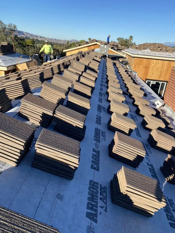 Slide of LT Roofing