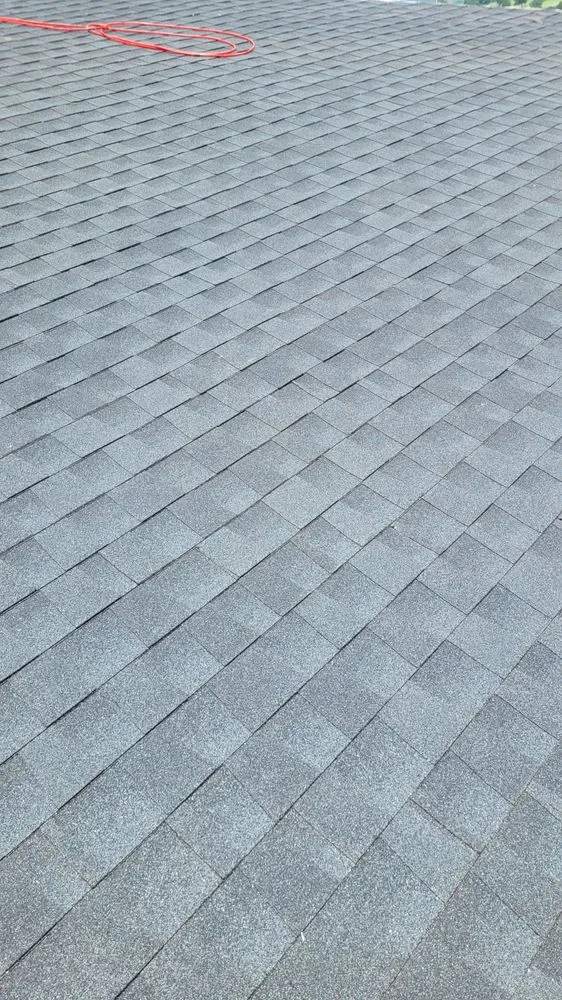 Slide of LTZ Roofing Pros