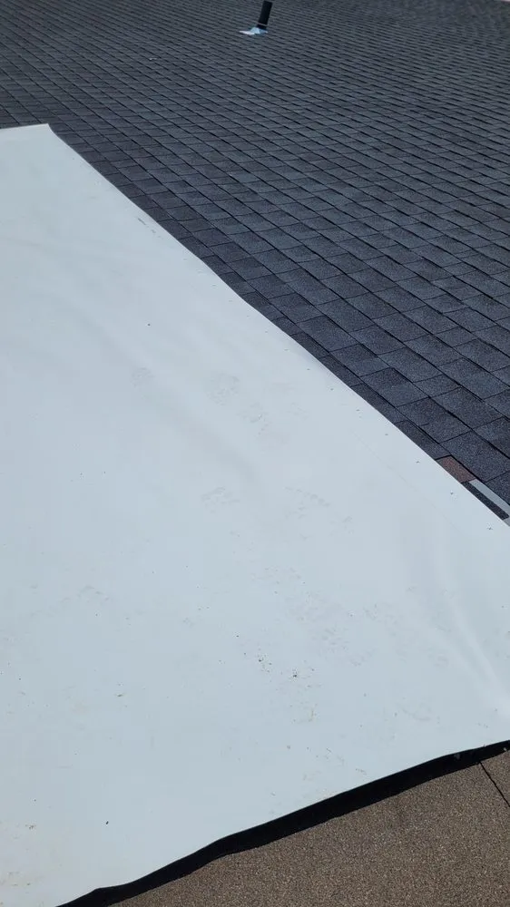 Slide of LTZ Roofing Pros