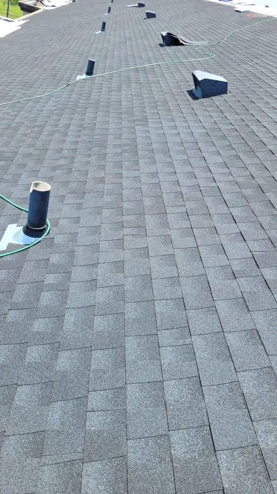 Slide of LTZ Roofing Pros