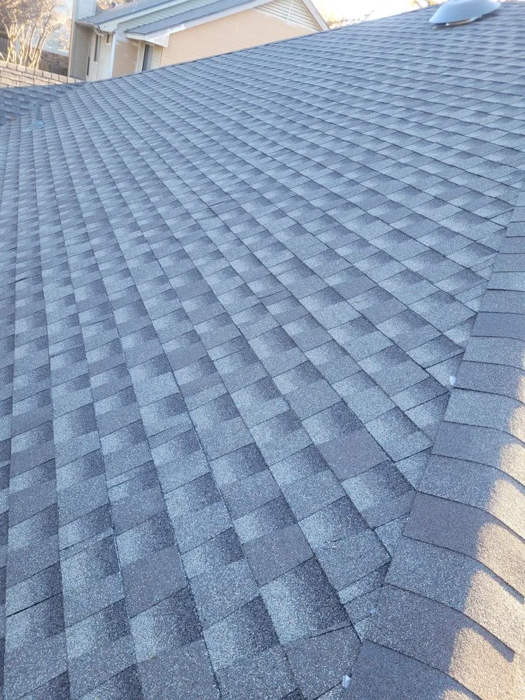 Slide of LTZ Roofing Pros