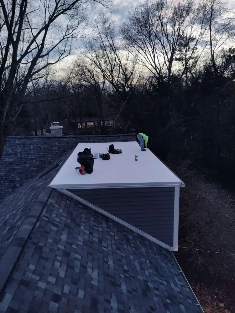 Slide of Luc Roofing