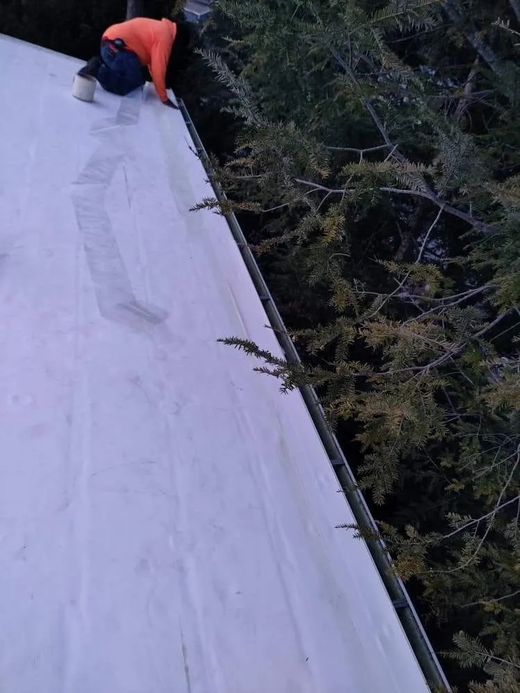 Slide of Luc Roofing