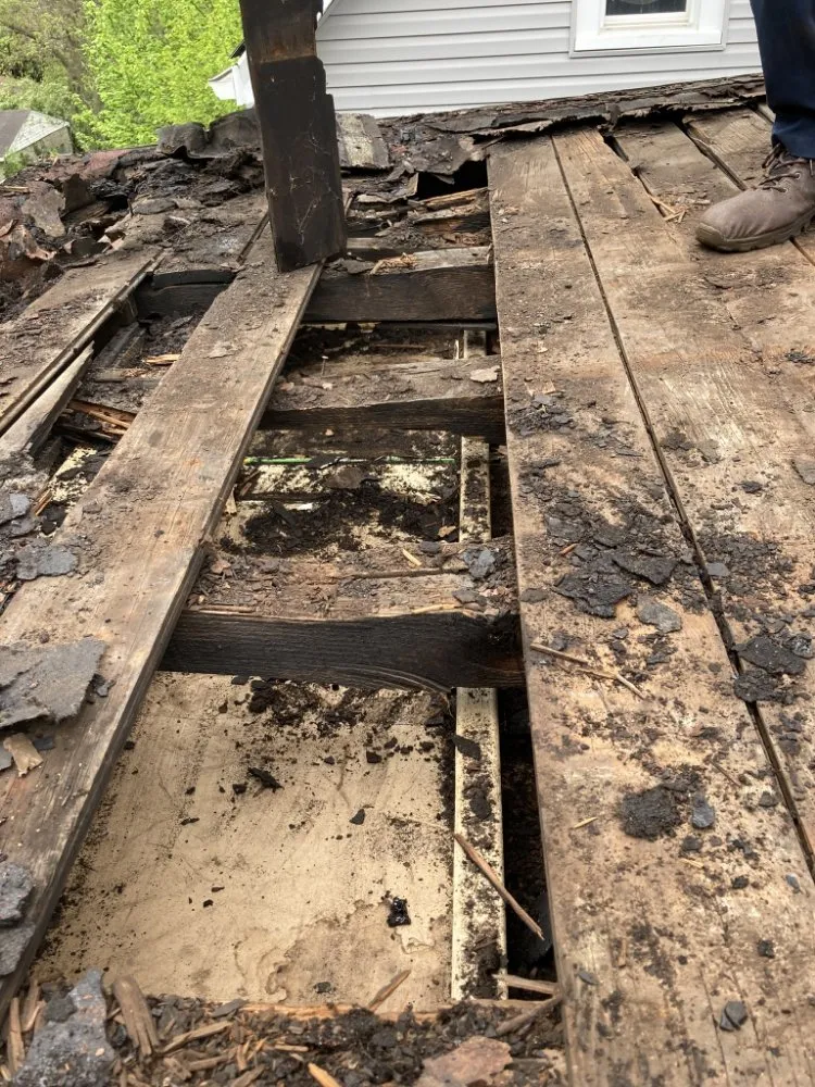 Slide of Luc Roofing