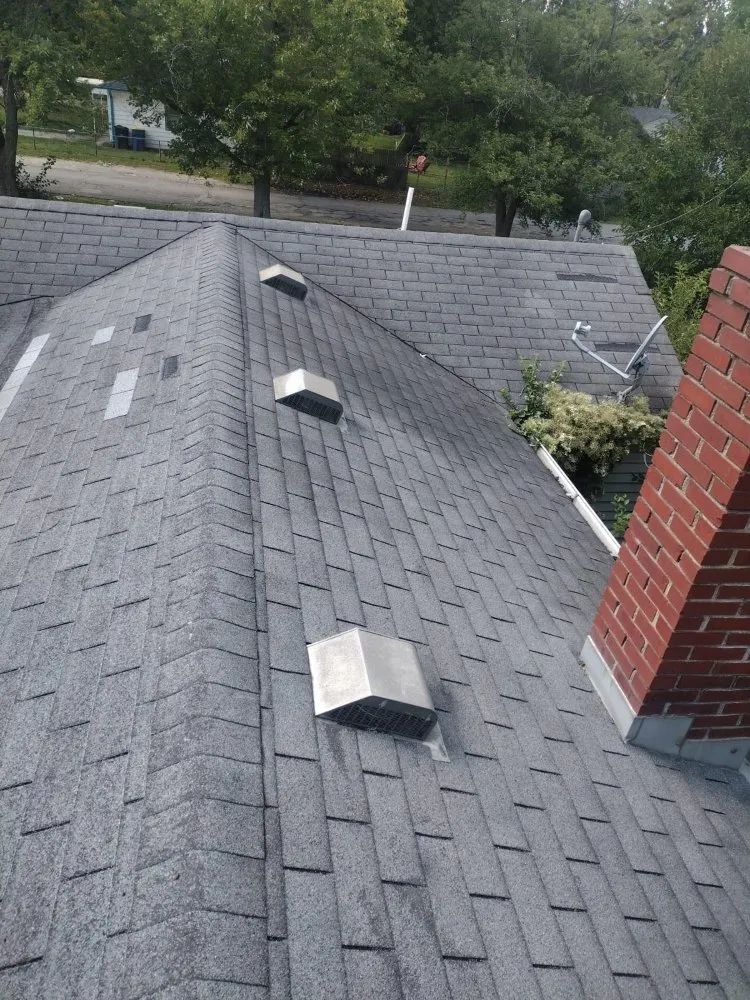 Slide of Luc Roofing