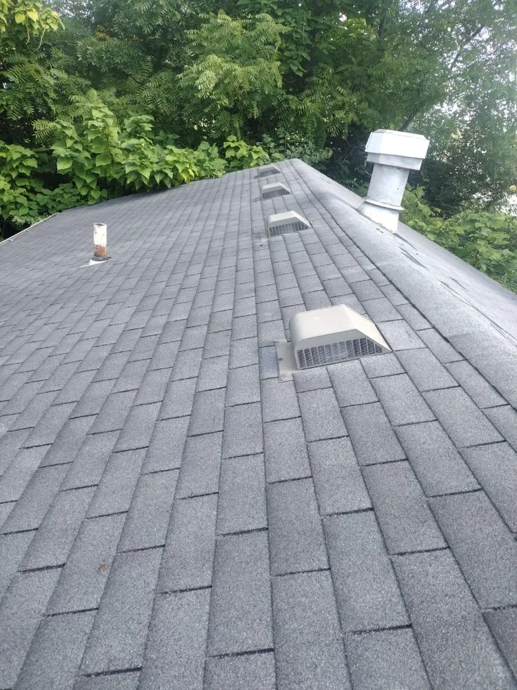 Slide of Luc Roofing