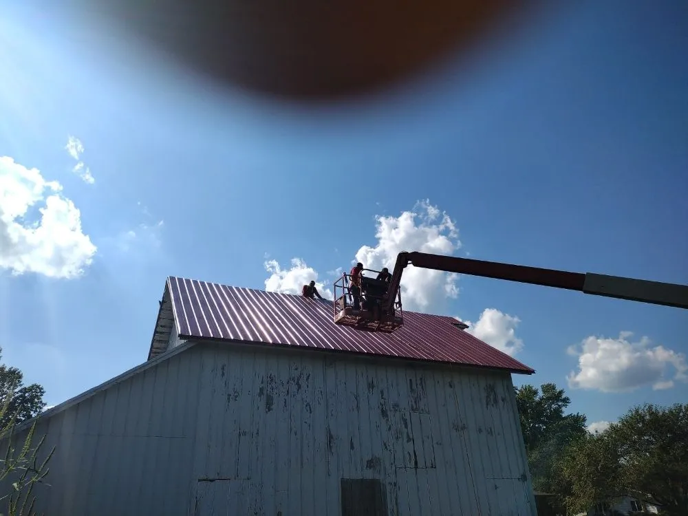 Slide of Luc Roofing