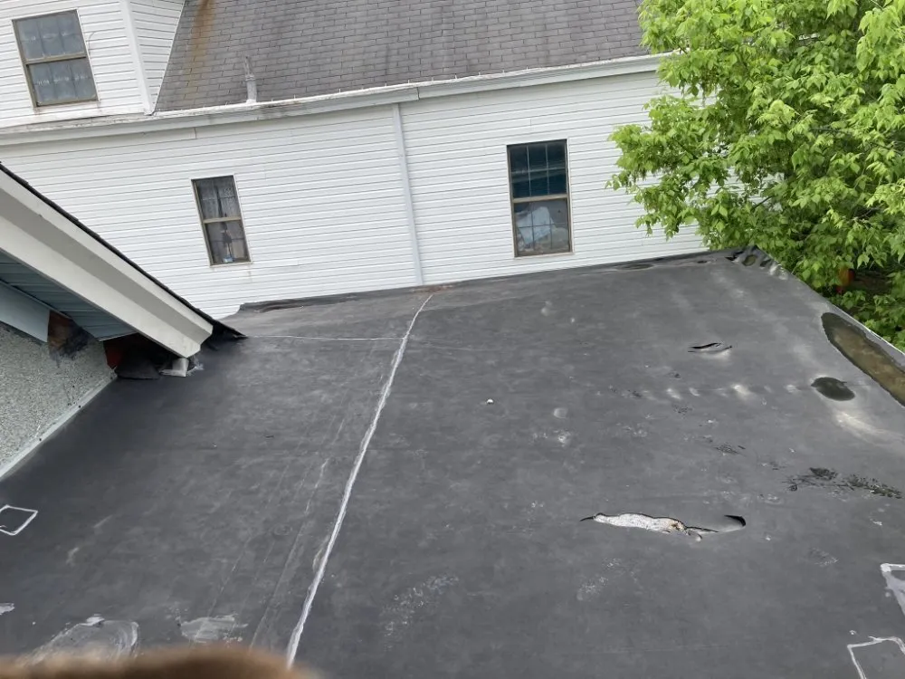 Slide of Luc Roofing