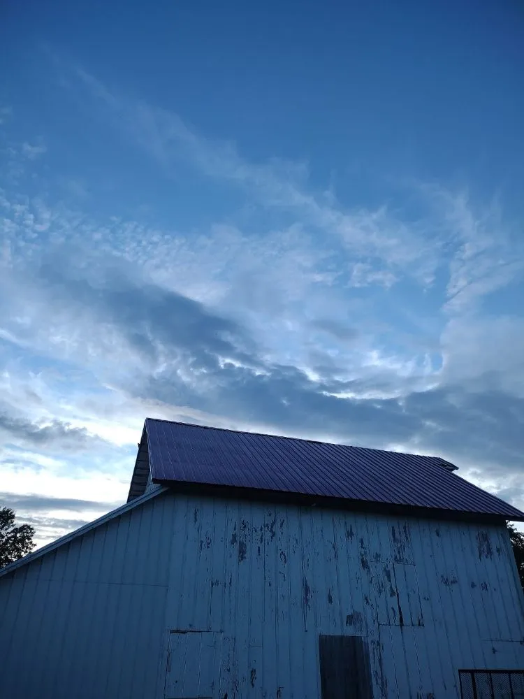 Slide of Luc Roofing