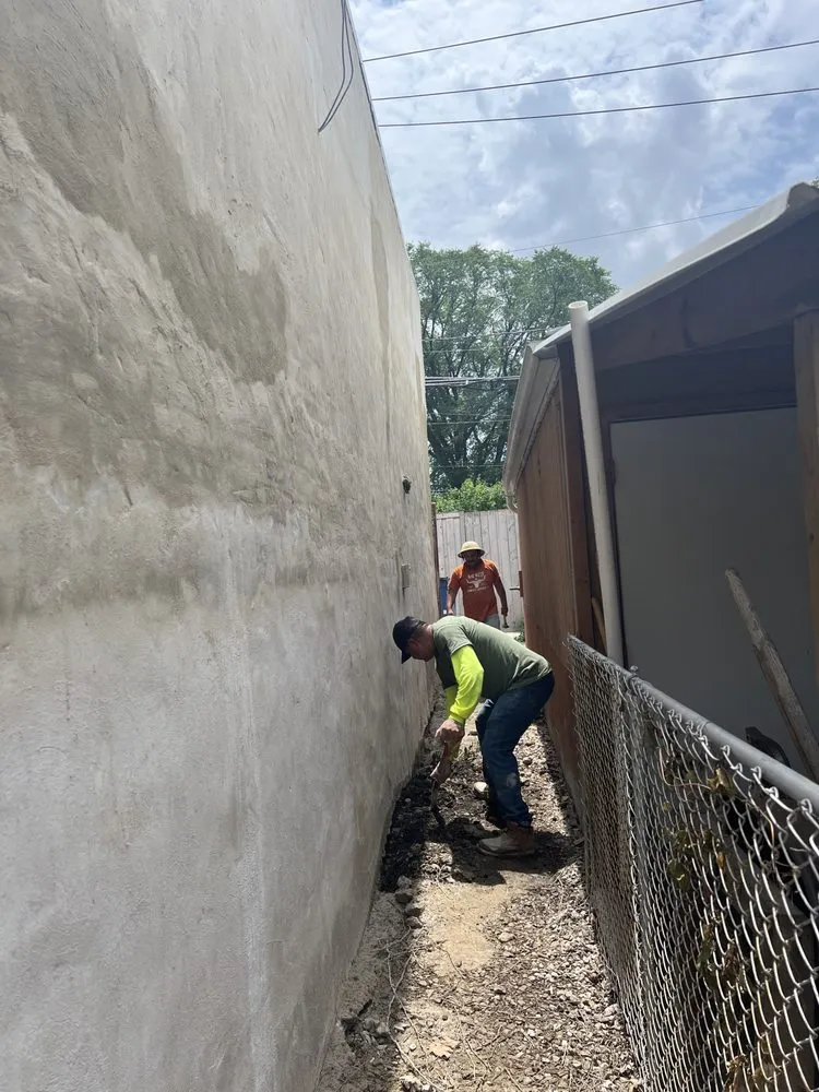 Slide of Lucas Brothers Roofing & Tuckpointing